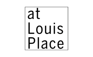 A black and white sign with black text.