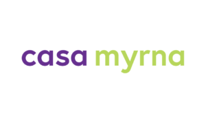 The logo features the words casa myrna in lowercase letters, with casa in purple and myrna in light green, set against a white background.