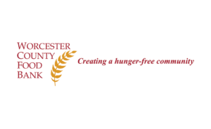 Worcester County Food Bank logo with a yellow wheat graphic and the slogan Creating a hunger-free community in red text on a white background.