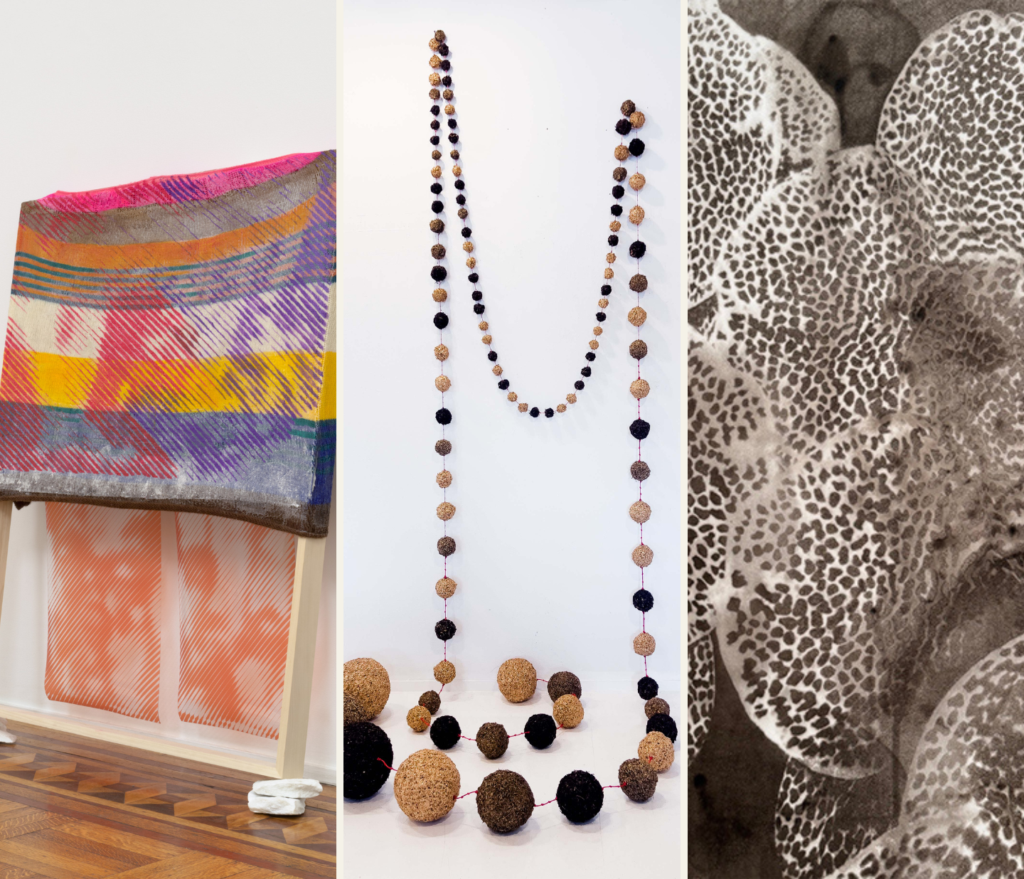 A colorful woven textile on a stand, a long necklace of brown and black beads against a white wall, and an abstract black-and-white pattern resembling textured, overlapping shapes.